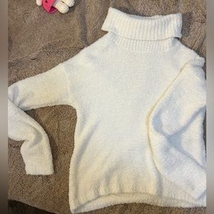 White fuzzy turtleneck sweater